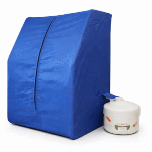 Blauwe Thaise stoomcabine Swedana met bijpassende stoompan, vrijstaand afgebeeld op een lichte achtergrond.