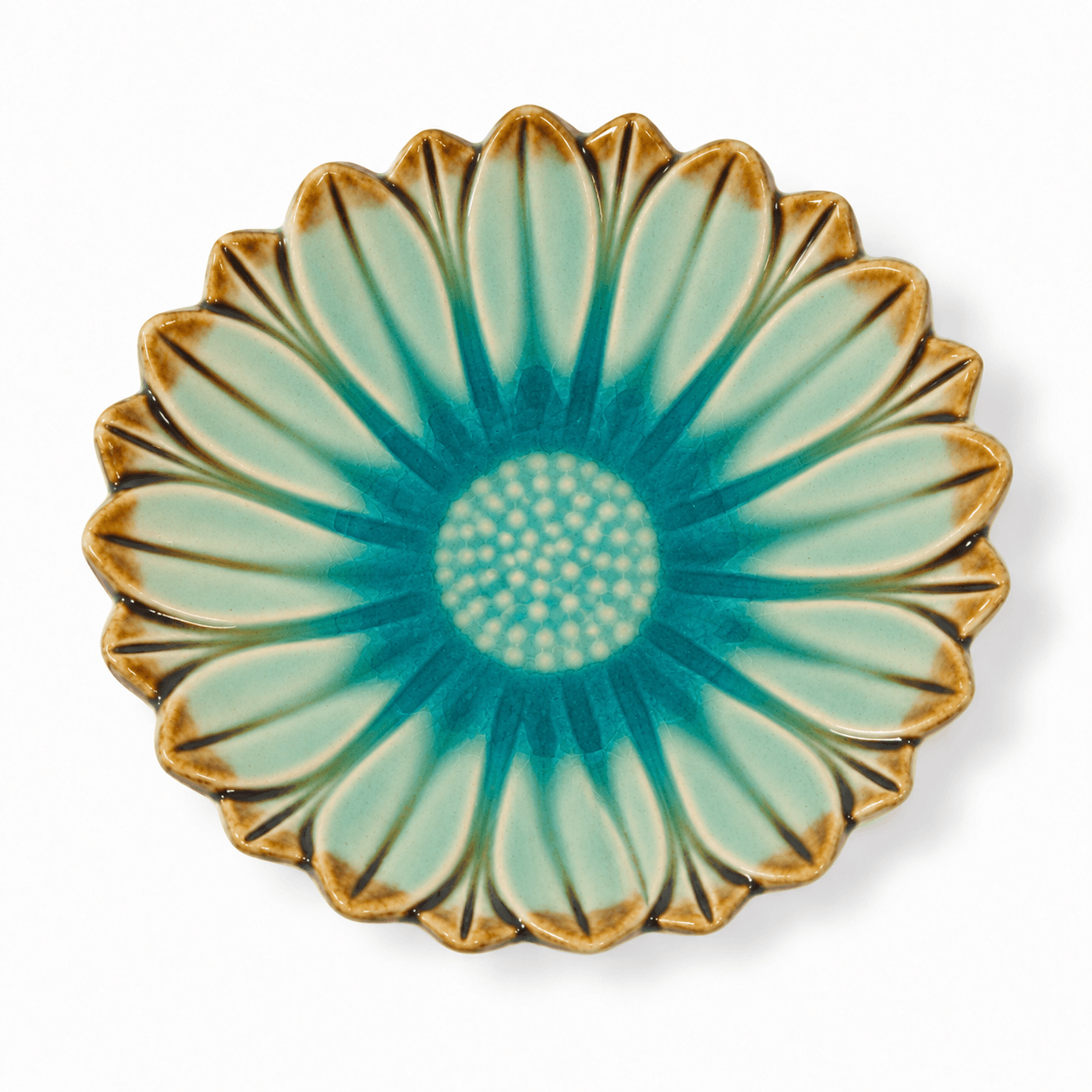 Blauw-bruin bloemenschaaltje van 13 cm met reliëf van bloembladeren, van bovenaf gezien.